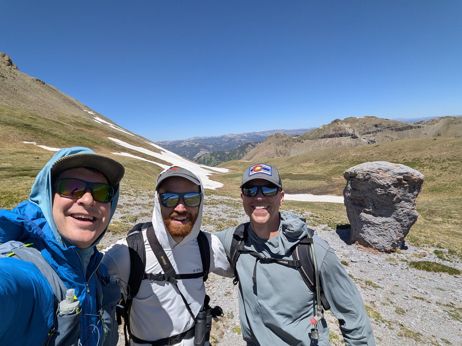The three OpenCurrent founders on a hike above treeline in the Colorado mountains